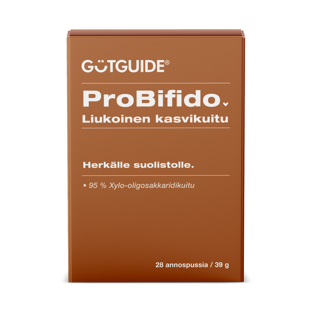Ruskea tuotepakkaus, jonka etupuolella on valkoista tekstiä. Ylhäällä lukee brändin nimi ”GUTGUIDE®” ja sen alla tuotteen nimi ”ProBifido” sekä teksti ”Liukoinen kasvikuitu”. Keskivaiheilla lukee ”Herkälle suolistolle.” ja sen alapuolella on listattu ainesosa: ”95 % Xylo-oligosakkaridikuitu”. Oikeassa alakulmassa on pakkauskoko: ”28 annospussia / 39 g